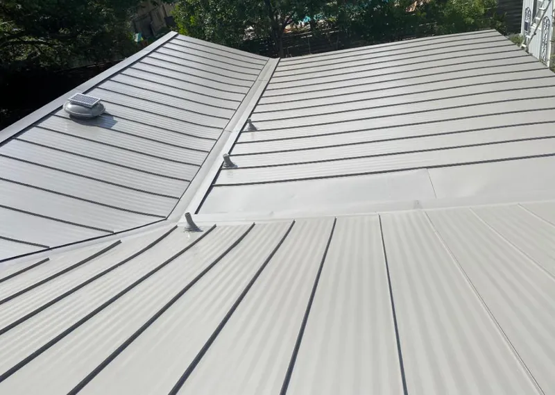 Solar attic fan installed on a metal roof for Roof Ventilation in San Pablo